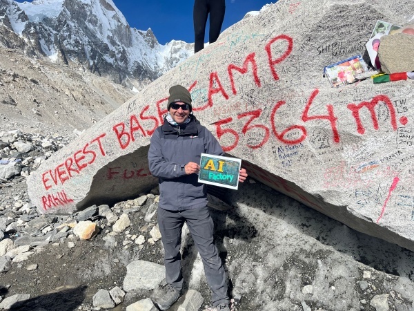 photo of James Barnett with AI Factory logo at Everest Base Camp